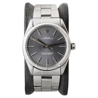 Pre-owned Rolex Stainless Oyster Perpetual With Machined Bezel Rare Charcoal Dial 1960's In Black
