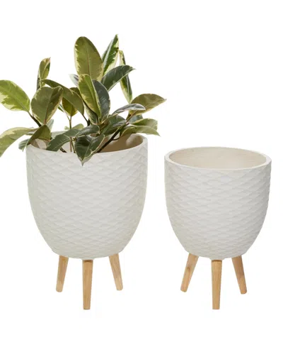 Rosemary Lane White Ceramic Indoor Outdoor Planter With Wood Legs Set Of 2