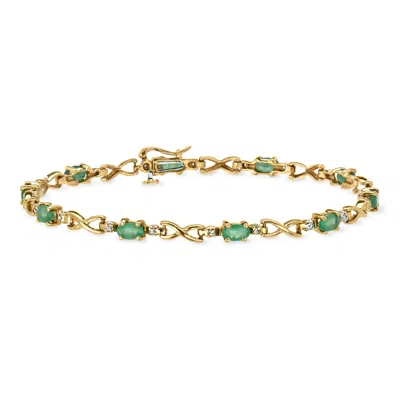 Pre-owned Ross-simons C. 1980 Vintage 2.00 Ct. T.w. Emerald Infinity-link Bracelet With .15 Ct. T.w. Diamonds In 10kt Yell In Gold