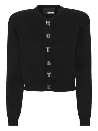 ROTATE BIRGER CHRISTENSEN CROPPED BLACK SWEATER WITH PADDED SHOULDERS AND BUTTON EMBELLISHMENTS