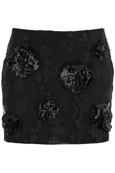 ROTATE BIRGER CHRISTENSEN MINI SKIRT IN RECYCLED BLACK POLYESTER MESH WITH FLORAL PATTERN