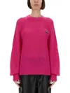 Rotate Birger Christensen Rotate Logo Embellished Jersey Sweater In Pink