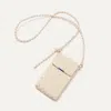 Rothys The Phone Crossbody In White/neutral In White Sand
