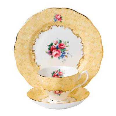 Royal Albert 100 Years Of  1990 3 Piece Bone China Teacup & Saucer Set In Yellow;pink
