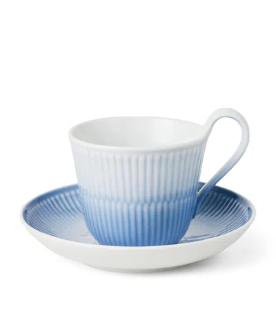 Royal Copenhagen Porcelain Iris Cup And Saucer In Blue