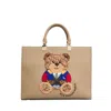 Rue Madame Structured Eco-leather Tote Bag With Teddy Bear Applique In Brown