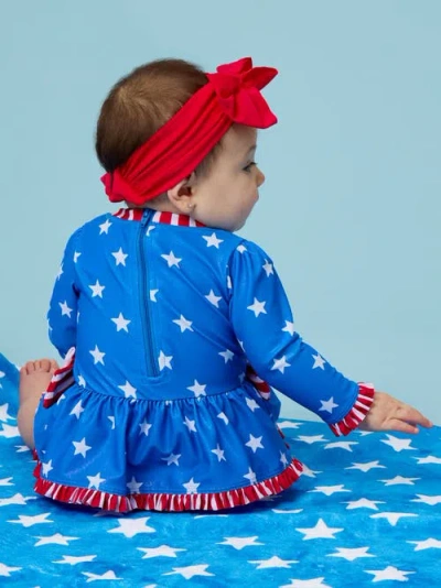 Rufflebutts Babies'  Upf50+ Long Sleeve One Piece Bow Peplum Rash Guard Swimsuit In Blue