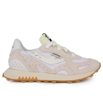 Run Of Sneakers In White