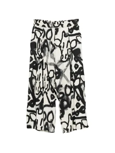 Rundholz Graffiti-print Trousers In Black