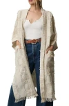 Saachi Shimmering Textured Fringe Long Duster In Ivory