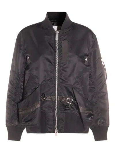 SACAI BLACK JACKET WITH RUFFLED HEM AND ADJUSTABLE DRAWSTRING WAIST