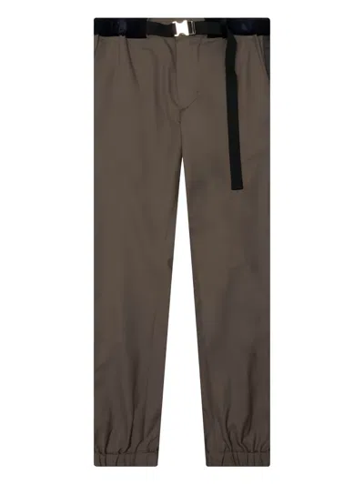 Sacai Buckle-fastening Trousers In Brown