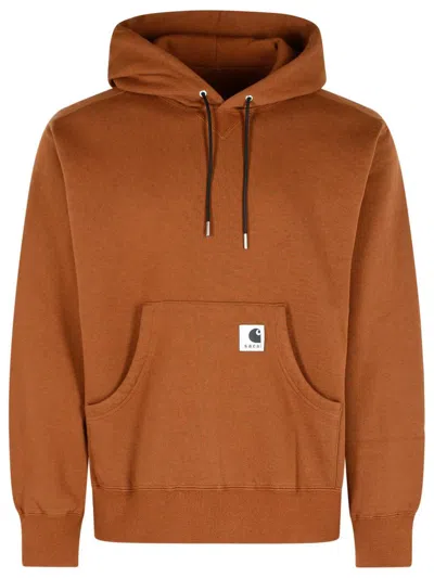 Sacai X Charhartt Logo Patch Drawstring Hoodie In Brown