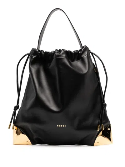 Sacai Corner Metal Drawstring Bag In Schwarz