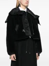 Sacai Teddy Cropped Bomber In Schwarz