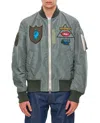 Sacai X Mark Gonzales Appliqué Twill Bomber Jacket In Green