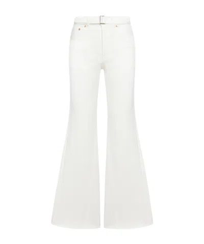 SACAI SACAI LOW-RISE FLARED JEANS
