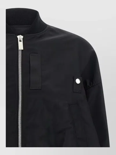 Sacai Nylon Asymmetric High-neck Ribbed Bomber Jacket In Black