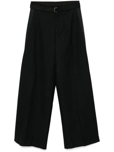 Sacai Pinstriped Trousers In Black