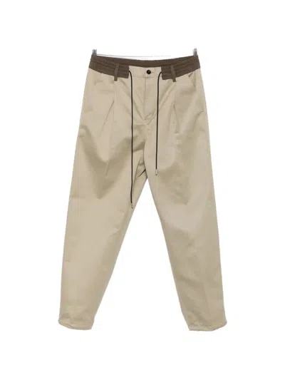 Sacai Pleated Drawstring Straight-leg Trousers In Brown