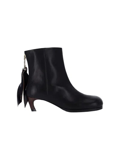 Sacai Puller Leather Ankle Booties In Black