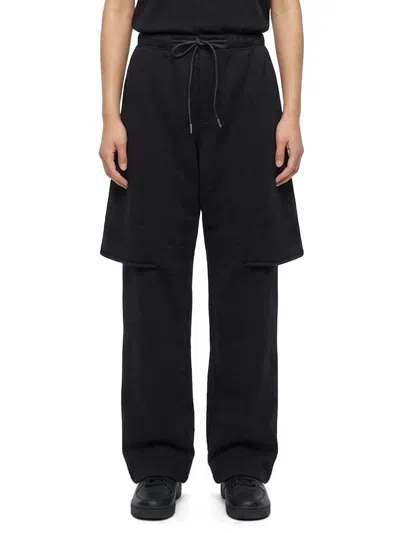 Sacai Relaxed Fit Cotton Jersey Trousers With Adjustable Drawstring In Black