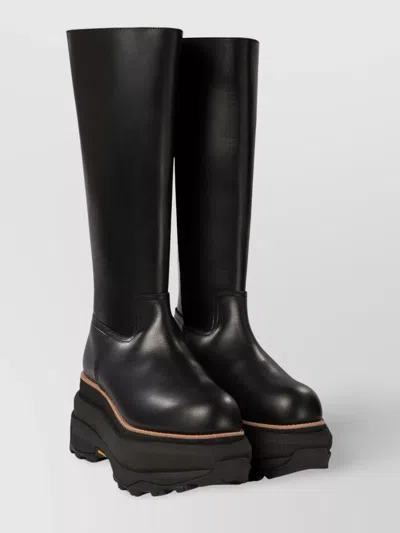 SACAI TALL BOOTS WITH LUG SOLE AND PLATFORM