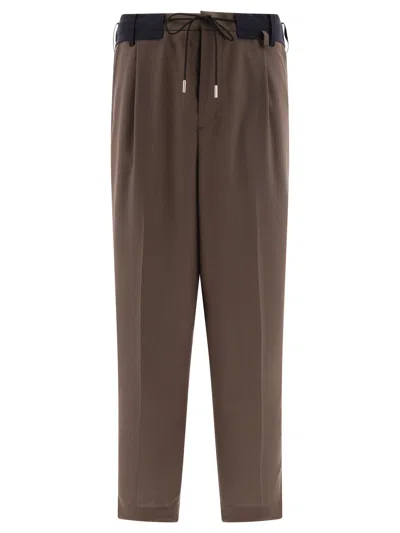 Sacai Tapered Drawstring Trousers Green In Brown