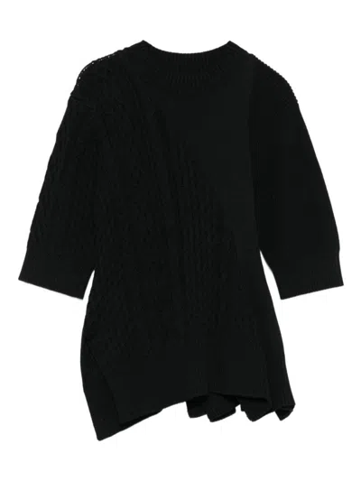 SACAI TEXTURED CABLE KNIT SWEATER WITH ASYMMETRIC HEM