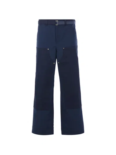 Sacai X Carhartt Wip Belt Loop Patch Trousers In Blue