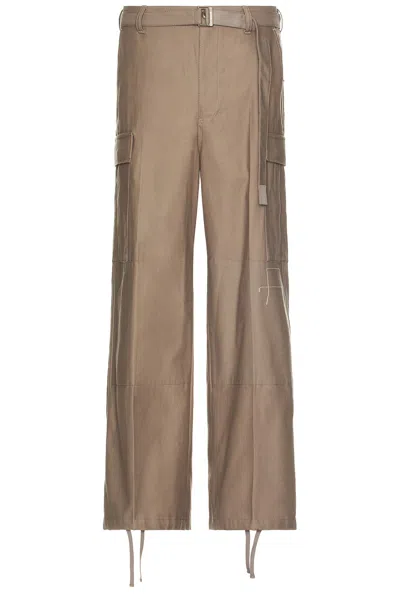パンツ sacai x WTAPS Cotton Back Satin Pants WTAPS Cotton Back Satin Pants in Beige – SVRN