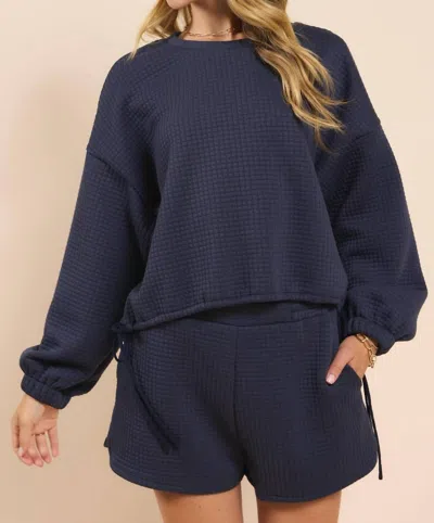 Sadie & Sage Pastime Textured Terry Side Tie Pullover In Navy In Blue
