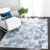 Safavieh Amelia Machine Made Area Rug, Ivory / Blue Contemporary Style Easy Care In Blue