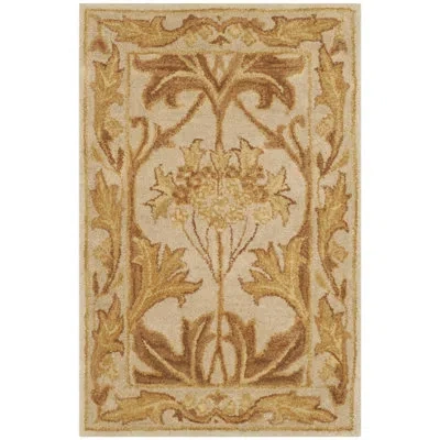 Safavieh Antiquity Hand Tufted Wool Oriental Rug In Brown