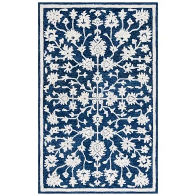 Safavieh Ebony Hand Tufted Wool Pile Oriental Rug In Ivory;navy