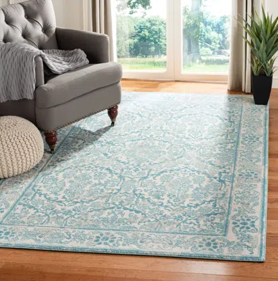 Safavieh Evoke Machine Made Area Rug, Ivory / Light Blue Traditional Style Easy Care