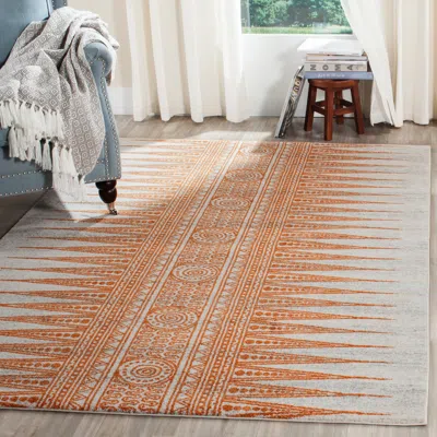Safavieh Evoke Machine Made Area Rug, Ivory / Orange Bohemian Style Easy Care In Brown