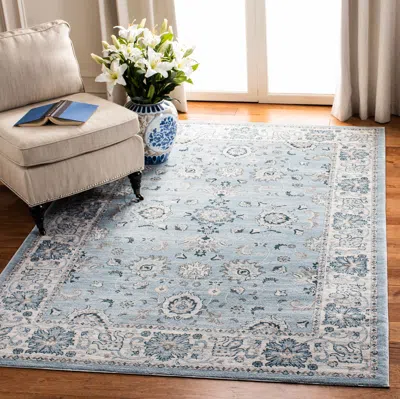 Safavieh Isabella Machine Made Area Rug, Light Blue / Cream Traditional Style Easy Care