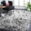 Safavieh Jasper Machine Made Area Rug, Black / Ivory Contemporary Style Easy Care In Gray