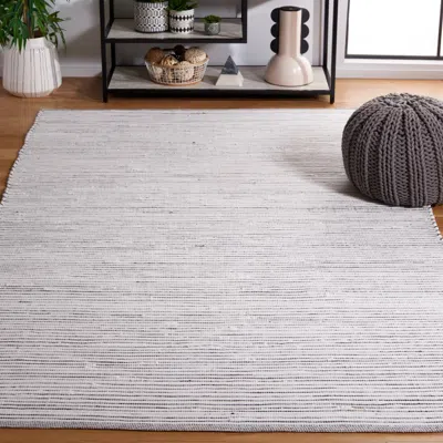 Safavieh Montauk Machine Made Area Rug, Brown / Ivory Contemporary Style Easy Care