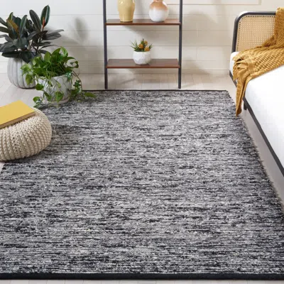 SAFAVIEH NATURA MACHINE MADE AREA RUG, BLACK SOLID / TONAL STYLE EASY CARE
