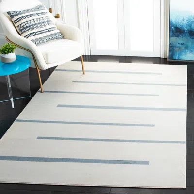 Safavieh Orwell Machine Made Area Rug, Ivory / Blue Contemporary Style Easy Care