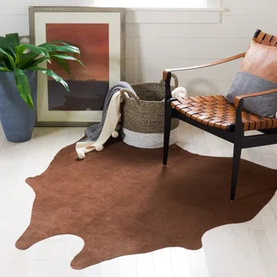 Safavieh Suede Cowhide Suede Leather Cowhide Suede Cowhide Solid Color Rug In Brown