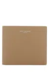 Saint Laurent Leather Wallet With Bi-fold Design And Textured Finish In Beige