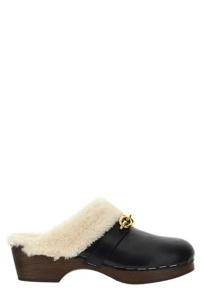 Saint Laurent Black Leather Clogs With Shearling Inserts And Gold Chain Detail For Women