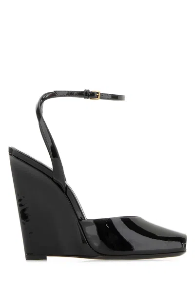 Saint Laurent La Scandale 110 Patent Leather Wedge Sandals In Black