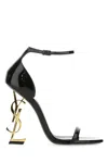 Saint Laurent Opyum Patent Leather Sandals With Structured Heel Featuring Metal Ysl Initials And Adj In Black