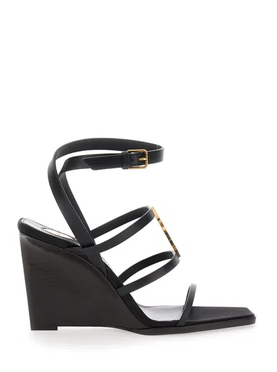 Saint Laurent Black Wedges With Metallic Cassandre Detail And Adjustable Leather Strap In Leather Wo