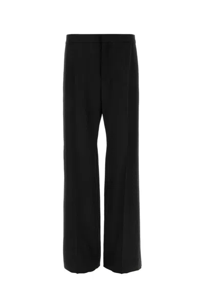 Saint Laurent Wool Trousers With Wide Leg And Crease In Black
