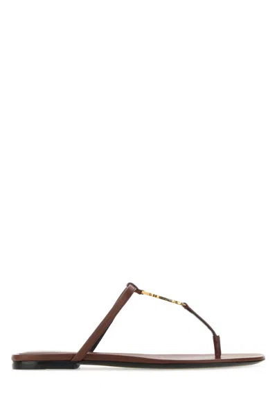 Saint Laurent Brown Leather Cassandre Thong Slippers In Aestheticbrownaest
